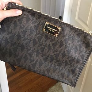 Used handful of time. Michael Kors wristlet